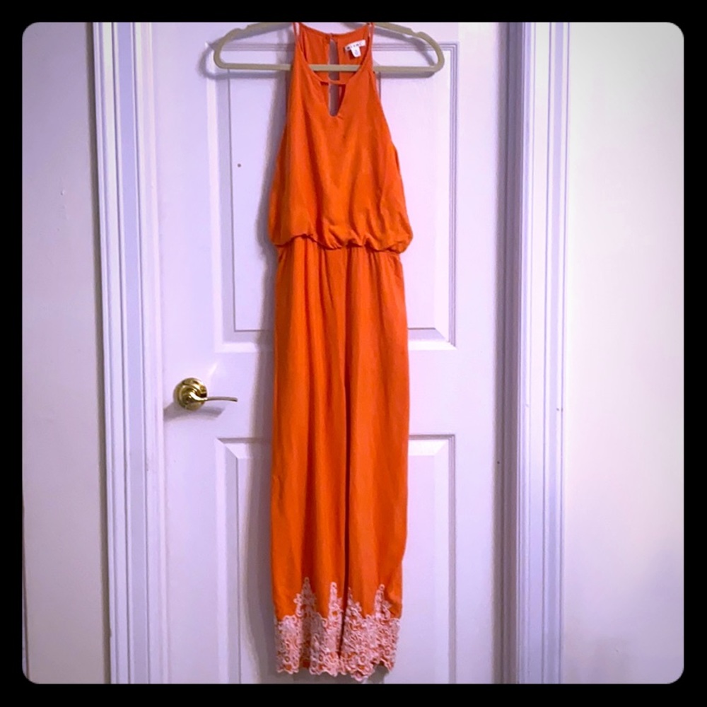 Orange linen jumpsuit with embroidery